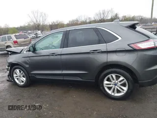2016 Ford Edge SEL z VIN 2FMPK4J87GBC61845, wystawiony jako IAAI lot #42017547 z przebiegiem 90 710 mil mil oraz . Historia ofert i sprzedaży dostępna na DreamBid. Obrazek 14.