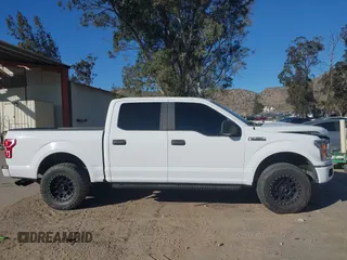 2020 Ford F-150 XL with VIN 1FTEW1CP7LKD24719, listed as a IAAI auction lot 41670273 with 57,188 mi miles. Bid and sale history available at carsss.com. Image 14.
