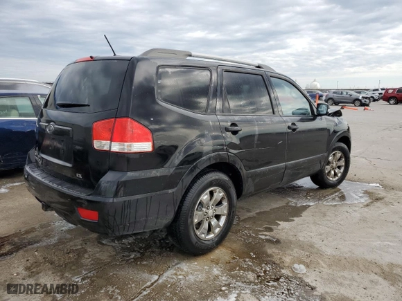 2009 Kia Borrego EX with VIN KNDJJ741295021249, listed as a Copart auction lot 82643094 with 209,580 mi miles and Salvage Title. Bid and sale history available at carsss.com. Image 3.