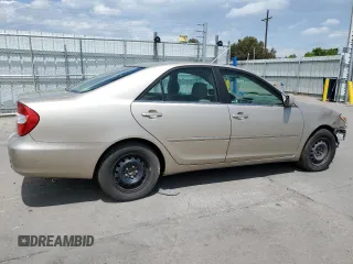 2002 Toyota Camry LE z VIN JTDBE32K620035753, wystawiony jako Copart lot #60176235 z przebiegiem 258 793 mil mil oraz Czysty tytuł • Clean title. Historia ofert i sprzedaży dostępna na DreamBid. Obrazek 3.