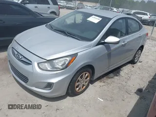 2013 Hyundai Accent GLS with VIN KMHCT4AE3DU403616, listed as a IAAI auction lot 42095208 with 128,523 mi miles. Bid and sale history available at carsss.com. Image 2.