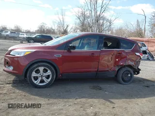 2016 Ford Escape SE with VIN 1FMCU0G75GUB22209, listed as a IAAI auction lot 41864084 with 96,313 mi miles. Bid and sale history available at carsss.com. Image 14.
