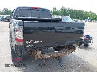 2013 Toyota Tacoma with VIN 3TMLU4EN4DM117239, listed as a IAAI auction lot 42494359 with 239,635 mi miles and . Bid and sale history available at DreamBid. Image 6.