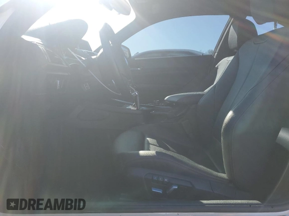2016 BMW 2 Series 228i xDrive with VIN WBA1G9C53GV599689, listed as a Copart auction lot 46358445 with 104,429 mi miles and Salvage title. Bid and sale history available at DreamBid. Image 7.