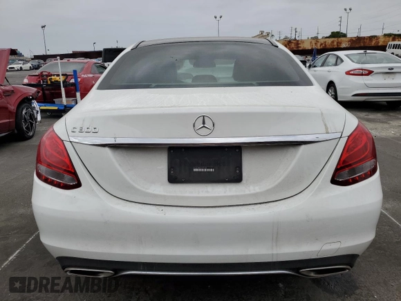 2016 Mercedes-Benz C 300 with VIN 55SWF4JB3GU155989, listed as a Copart auction lot 61872425 with 132,637 mi miles and Salvage title. Bid and sale history available at DreamBid. Image 6.