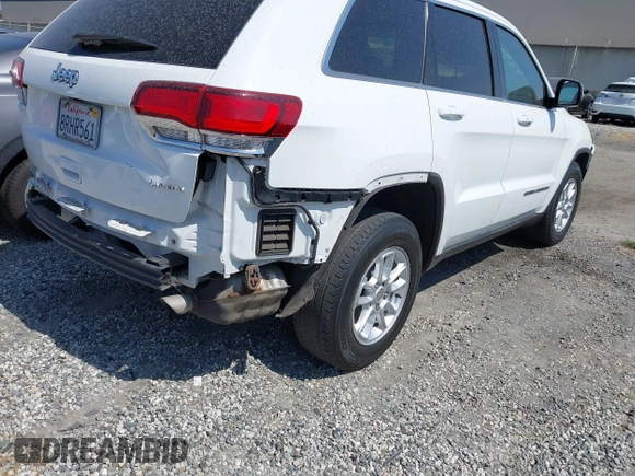 2020 Jeep Grand Cherokee Altitude with VIN 1C4RJEAG3LC202749, listed as a IAAI auction lot 42272959 with 90,698 mi miles and . Bid and sale history available at DreamBid. Image 4.