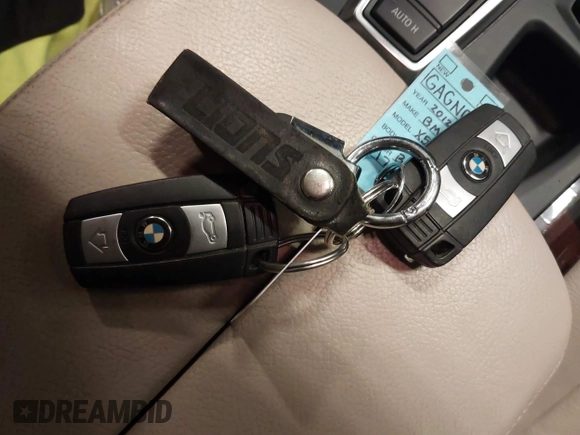 2012 BMW X5 35i with VIN 5UXZV4C55CL990510, listed as a IAAI auction lot 41849293 with 117,522 mi miles and . Bid and sale history available at DreamBid. Image 11.