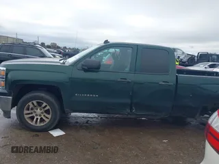 2014 Chevrolet Silverado 1500 LT with VIN 1GCRCREH7EZ340962, listed as a IAAI auction lot 41470994 with 179,326 mi miles and . Bid and sale history available at DreamBid. Image 14.
