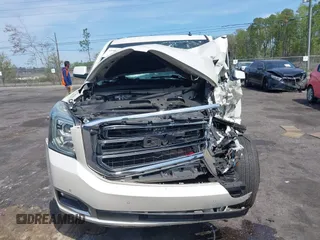 2015 GMC Yukon XL SLT with VIN 1GKS1HKC0FR154518, listed as a IAAI auction lot 41905683 with 162,482 mi miles. Bid and sale history available at carsss.com. Image 12.