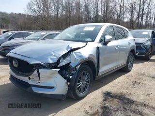 2020 Mazda CX-5 Touring with VIN JM3KFBCM3L0791816, listed as a IAAI auction lot 41761623 with 87,742 mi miles and . Bid and sale history available at carsss.com. Image 2.