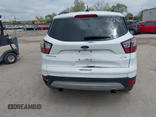 2018 Ford Escape SE z VIN 1FMCU9GDXJUC99453, wystawiony jako IAAI lot #42195202 z przebiegiem 191 840 mil mil oraz . Historia ofert i sprzedaży dostępna na DreamBid. Obrazek 16.