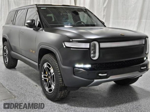 2023 Rivian R1S Launch Edition with VIN 7PDSGABL2PN020404, listed as a Copart auction lot 81428984 with 128 mi miles and Clean Title. Bid and sale history available at carsss.com. Image 1.