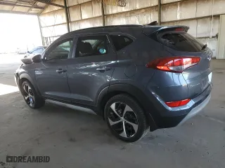 2018 Hyundai Tucson Value with VIN KM8J33A23JU823248, listed as a Copart auction lot 42967005 with 107,295 mi miles and Salvage Title. Bid and sale history available at carsss.com. Image 2.