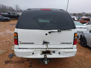 2004 Chevrolet Suburban LS with VIN 1GNEC16Z54J207144, listed as a IAAI auction lot 41244963 with 246,498 mi miles. Bid and sale history available at carsss.com. Image 16.