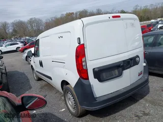 2021 Ram ProMaster City Cargo Van Tradesman with VIN ZFBHRFAB3M6U12673, listed as a IAAI auction lot 41914013 with 84,879 mi miles. Bid and sale history available at carsss.com. Image 3.
