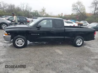 2000 Dodge Dakota with VIN 1B7GL22X6YS703226, listed as a IAAI auction lot 40849454 with 105,990 mi miles. Bid and sale history available at carsss.com. Image 14.
