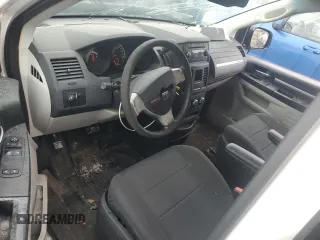2010 Dodge Grand Caravan Cargo with VIN 2D4CN1AEXAR377301, listed as a Copart auction lot 71476774 with 125,421 mi miles and Salvage Title. Bid and sale history available at carsss.com. Image 8.