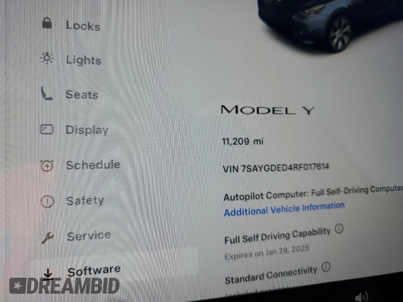 2024 Tesla Model Y with VIN 7SAYGDED4RF017614, listed as a Copart auction lot 45754675 with 11,209 mi miles and Salvage title. Bid and sale history available at DreamBid. Image 13.