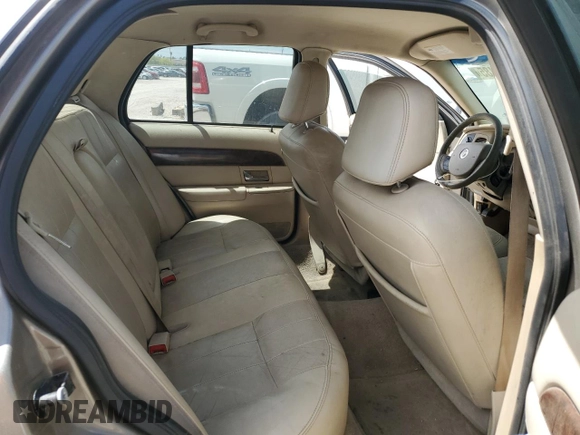 2006 Mercury Grand Marquis LS Premium z VIN 2MEFM75W76X631907, wystawiony jako Copart lot #53252485 z przebiegiem 264 074 mil mil oraz Czysty tytuł • Clean title. Historia ofert i sprzedaży dostępna na DreamBid. Obrazek 10.