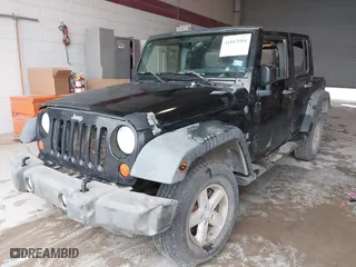 2007 Jeep Wrangler Unlimited X with VIN 1J4GA391X7L209435, listed as a IAAI auction lot 41813504 with 213,334 mi miles. Bid and sale history available at carsss.com. Image 16.