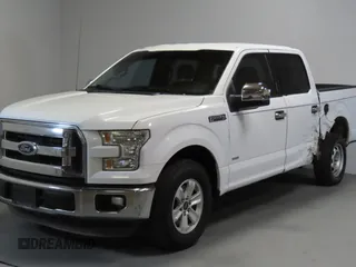 2015 Ford F-150 XL with VIN 1FTEW1CG0FKD61342, listed as a Copart auction lot 60142545 with 113,798 mi miles and Salvage title. Bid and sale history available at DreamBid. Image 2.