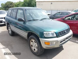 2000 Toyota RAV4 with VIN JT3GP10V0Y7077311, listed as a IAAI auction lot 42316525 with 299,397 mi miles and . Bid and sale history available at DreamBid. Image 1.