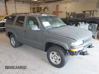 2004 Chevrolet Tahoe LS with VIN 1GNEK13ZX4J204098, listed as a IAAI auction lot 42143393 with 293,548 mi miles. Bid and sale history available at carsss.com. Image 1.