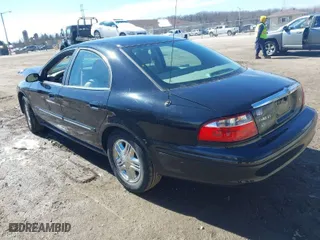 2005 Mercury Sable LS with VIN 1MEFM55S45A620484, listed as a IAAI auction lot 41811596 with 106,892 mi miles. Bid and sale history available at carsss.com. Image 3.