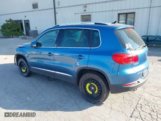 2017 Volkswagen Tiguan Wolfsburg Edition with VIN WVGRV7AX0HW502041, listed as a IAAI auction lot 31232130 with 30,214 mi miles. Bid and sale history available at carsss.com. Image 3.