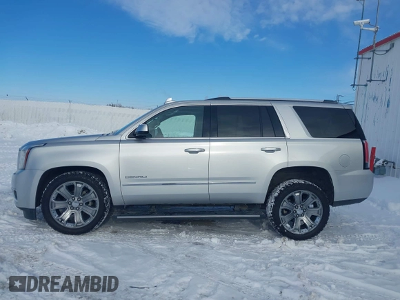 2016 GMC Yukon Denali with VIN 1GKS2CKJ7GR151020, listed as a IAAI auction lot 41539216 with 120,893 mi miles. Bid and sale history available at carsss.com. Image 14.