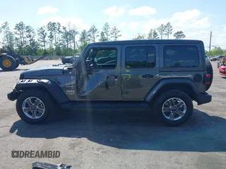 2022 Jeep Wrangler Unlimited Sahara with VIN 1C4HJXEN2NW194502, listed as a IAAI auction lot 42002455 with 34,861 mi miles and . Bid and sale history available at DreamBid. Image 14.