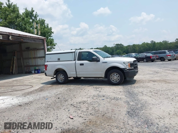 2018 Ford F-150 XL with VIN 1FTMF1CB3JKE51738, listed as a IAAI auction lot 42387561 with 110,951 mi miles and . Bid and sale history available at DreamBid. Image 14.