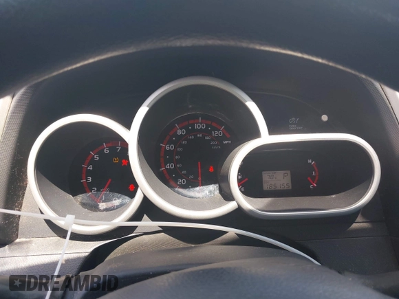 2009 Toyota Matrix with VIN 2T1KU40E99C119135, listed as a IAAI auction lot 42136716 with 185,155 mi miles. Bid and sale history available at carsss.com. Image 7.