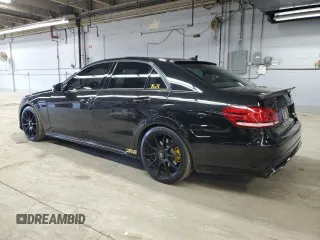 2014 Mercedes-Benz E 550 Sport with VIN WDDHF9BBXEA883116, listed as a Copart auction lot 50395055 with 124,022 mi miles and Clean Title. Bid and sale history available at DreamBid. Image 2.