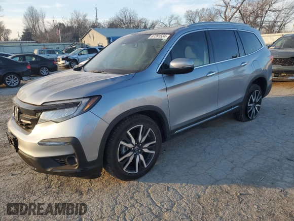 2020 Honda Pilot Touring 8-Passenger with VIN 5FNYF6H96LB029385, listed as a Copart auction lot 87391534 with 68,201 mi miles and Salvage Title. Bid and sale history available at DreamBid. Image 1.