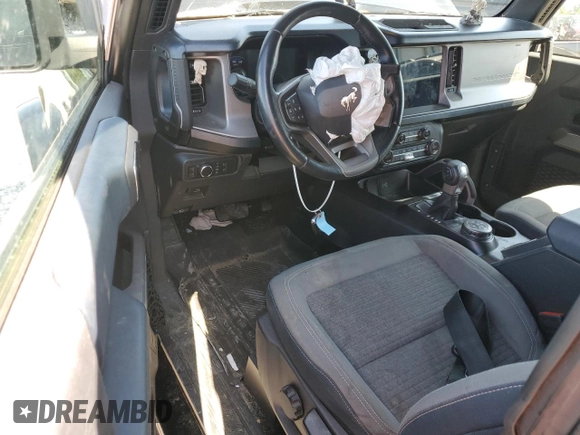 2021 Ford Bronco z VIN 1FMDE5APXMLA63439, wystawiony jako Copart lot #58100614 z przebiegiem 42 973 mil mil oraz Szkoda całkowita • Salvage title. Historia ofert i sprzedaży dostępna na DreamBid. Obrazek 8.