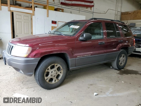 2001 Jeep Grand Cherokee Laredo z VIN 1J4GW48S11C609344, wystawiony jako Copart lot #59258245 z przebiegiem 162 141 mil mil oraz Szkoda całkowita • Salvage title. Historia ofert i sprzedaży dostępna na DreamBid. Obrazek 1.