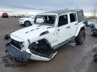 2015 Jeep Wrangler Unlimited Sahara with VIN 1C4BJWEG5FL518191, listed as a IAAI auction lot 41914581 with 107,433 mi miles. Bid and sale history available at carsss.com. Image 19.