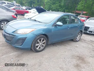 2011 Mazda Mazda3 i Touring with VIN JM1BL1VG4B1375978, listed as a IAAI auction lot 42120448 with 144,753 mi miles. Bid and sale history available at carsss.com. Image 2.
