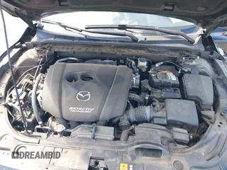 2018 Mazda Mazda6 Touring with VIN JM1GL1VM2J1308743, listed as a IAAI auction lot 41872947 with 125,236 mi miles. Bid and sale history available at carsss.com. Image 10.