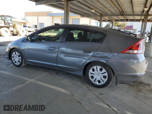 2013 Honda Insight with VIN JHMZE2H3XDS003838, listed as a Copart auction lot 52220235 with 144,729 mi miles and Salvage title. Bid and sale history available at DreamBid. Image 2.
