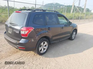 2014 Subaru Forester Premium z VIN JF2SJAEC4EH467916, wystawiony jako IAAI lot #42417753 z przebiegiem 105 849 mil mil oraz . Historia ofert i sprzedaży dostępna na DreamBid. Obrazek 4.
