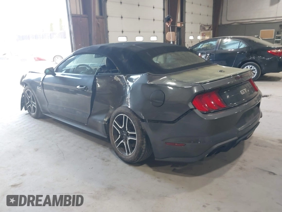 2019 Ford Mustang GT Premium with VIN 1FATP8FF4K5171686, listed as a IAAI auction lot 42073812 with 128,768 mi miles. Bid and sale history available at carsss.com. Image 3.