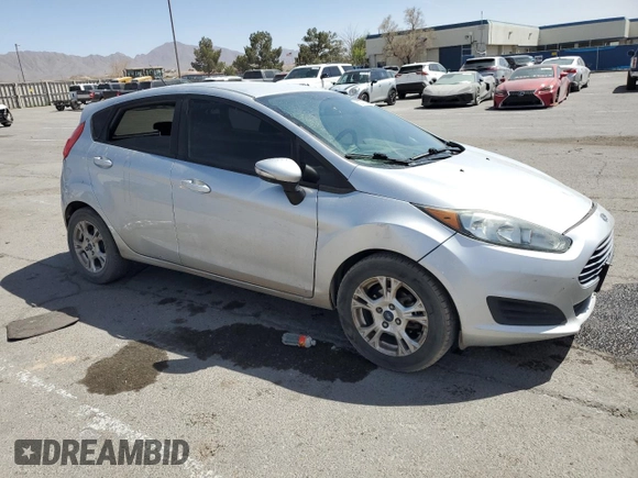 2015 Ford Fiesta SE with VIN 3FADP4EJ2FM176548, listed as a Copart auction lot 50770015 with 129,006 mi miles and Salvage Title. Bid and sale history available at carsss.com. Image 4.