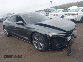 2024 Audi e-tron GT Premium Plus z VIN WAUFJBFW0R7000208, wystawiony jako IAAI lot #40787476 z przebiegiem 7765 mil mil oraz . Historia ofert i sprzedaży dostępna na DreamBid. Obrazek 1.