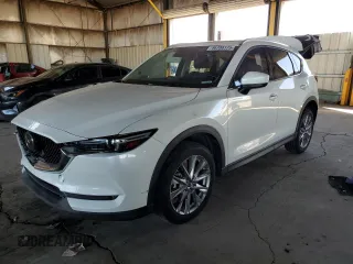2019 Mazda CX-5 Grand Touring with VIN JM3KFADM2K0541152, listed as a Copart auction lot 46708175 with 77,333 mi miles and Salvage Title. Bid and sale history available at carsss.com. Image 1.