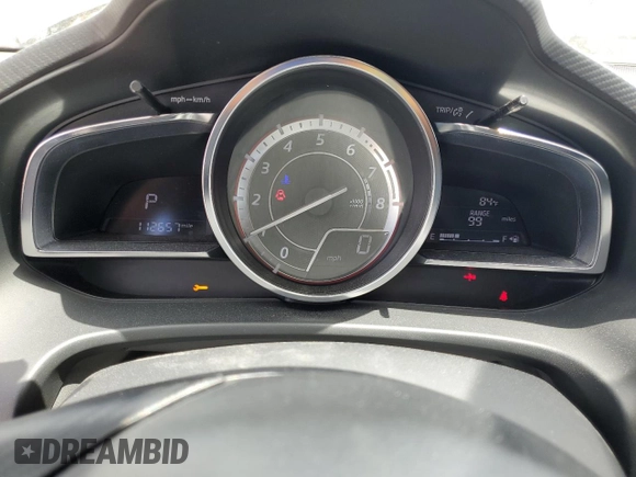 2015 Mazda 3 S Grand Touring with VIN JM1BM1W37F1237706, listed as a Copart auction lot 52785545 with 112,657 mi miles and Salvage Title. Bid and sale history available at DreamBid. Image 9.