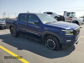 2022 Nissan Frontier Pro-X with VIN 1N6ED1EJ5NN610792, listed as a Copart auction lot 59897795 with 51,214 mi miles and Salvage title. Bid and sale history available at DreamBid. Image 4.