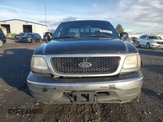2003 Ford F-150 XL with VIN 1FTRX17L23NA98321, listed as a Copart auction lot 80576014 with 0 mi miles and Salvage Title. Bid and sale history available at carsss.com. Image 5.