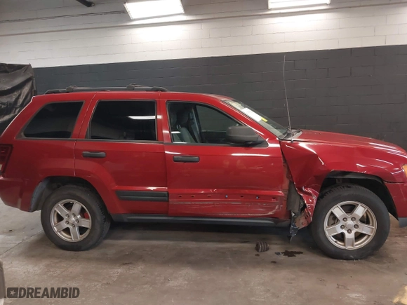 2005 Jeep Grand Cherokee Laredo with VIN 1J4HR48N45C539639, listed as a IAAI auction lot 41890163 with 84,470 mi miles. Bid and sale history available at carsss.com. Image 13.